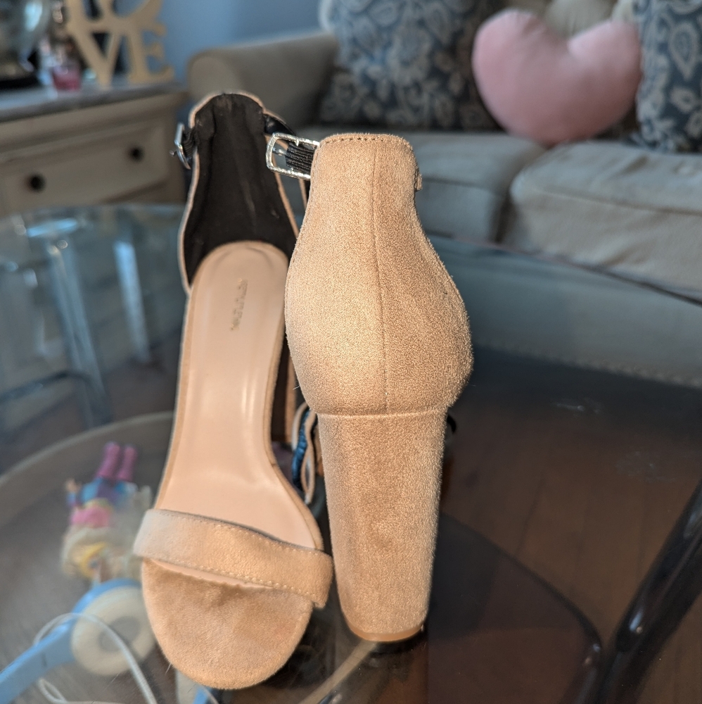 Beautiful suede high heels,never worn ,size 5, color beige